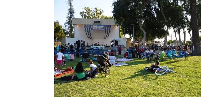 families sitting on grass